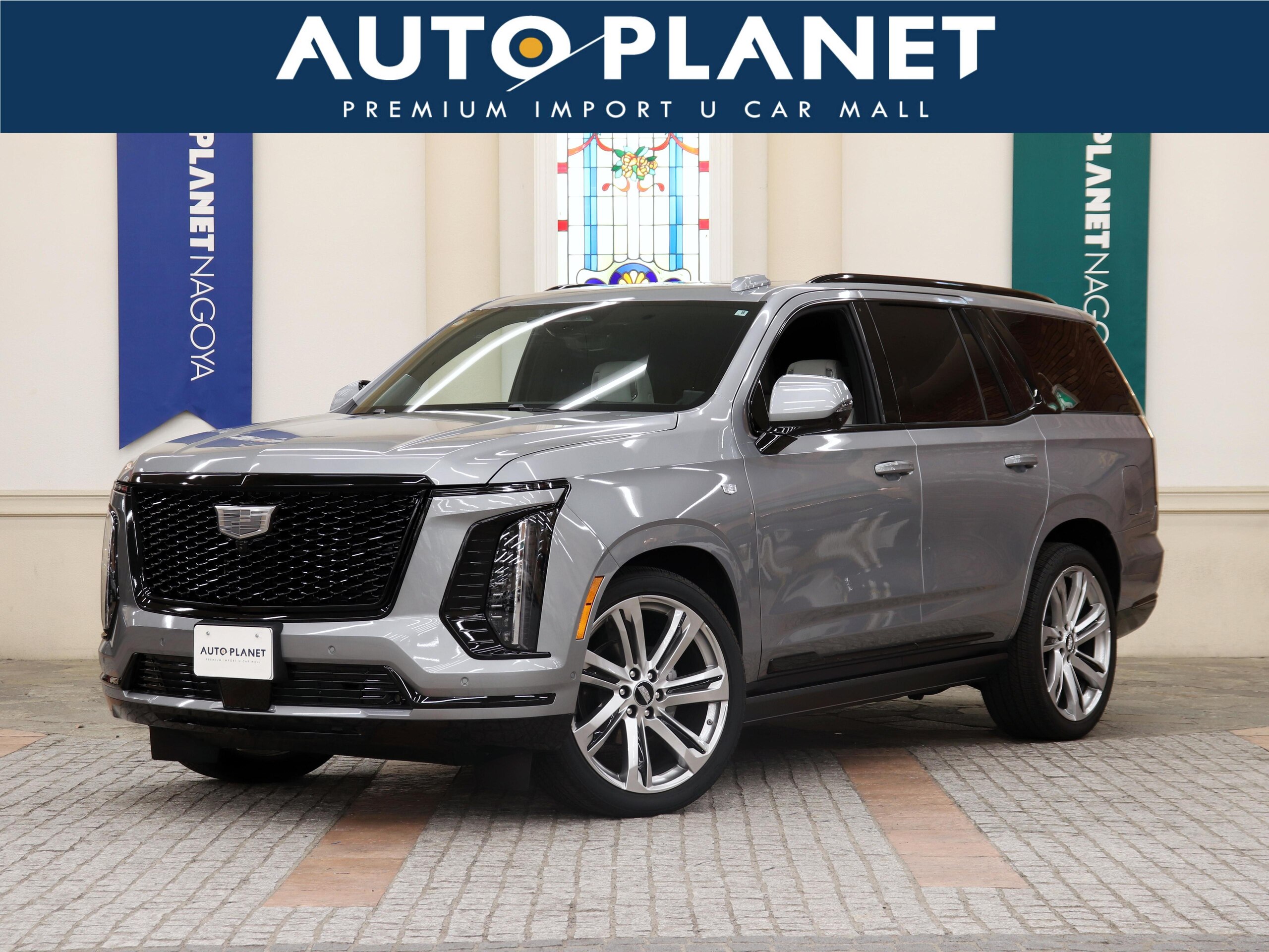 2025 Cadillac Escalade - キャデラック エスカレード スポーツ ローンチ エディション4WD 日本限定モデル50台限定/ワンオーナー/禁煙車/左ハンドル/白革シート/サンルーフ/グロスブラックモデルバッジ/24インチアルミ/シェアグレイ・ジェットブラックアクセント/ACC