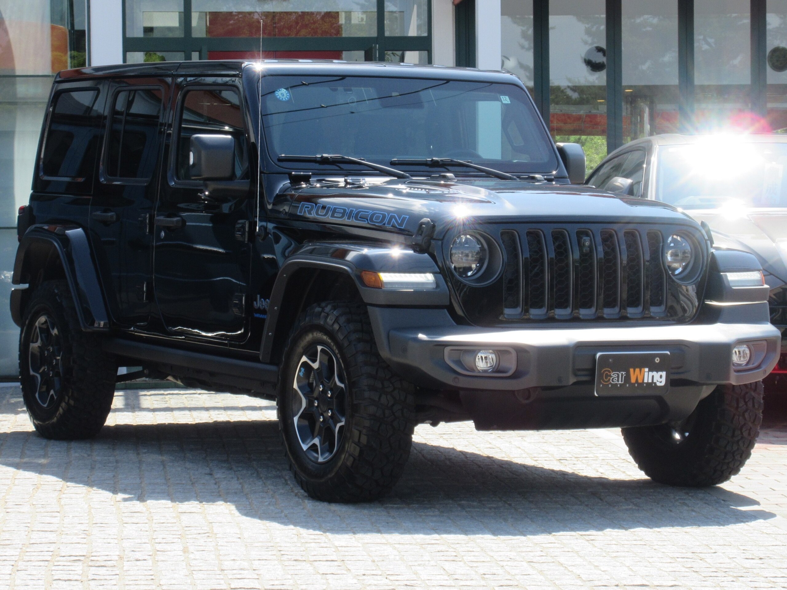2024 Jeep Wrangler - ジープ ラングラー アンリミテッド ルビコン 4xe 4WD 専用17インチAW ダークグレーアクセント入りフロントグリル ロックレール LEDヘッドライト レザーシート シートヒーター サブウーハー付きアルパイン製スピーカー 純正ドライブレコーダー