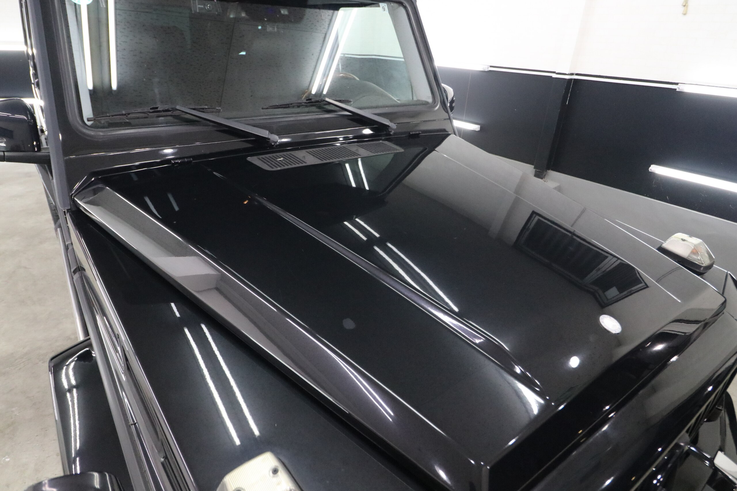 2007 Mercedes-Benz G-Class - メルセデス・ベンツ Gクラス G500 ロング 4WD 後期AMG G65仕様 前後ルーフスポイラー 21インチアルミホイール 社外HDDナビ フロント・バックカメラ 後期7速AT 黒革シート ディーラー車 サイド左右4本出しマフラー ドラレコ 前後シートヒーター 左ハンドル