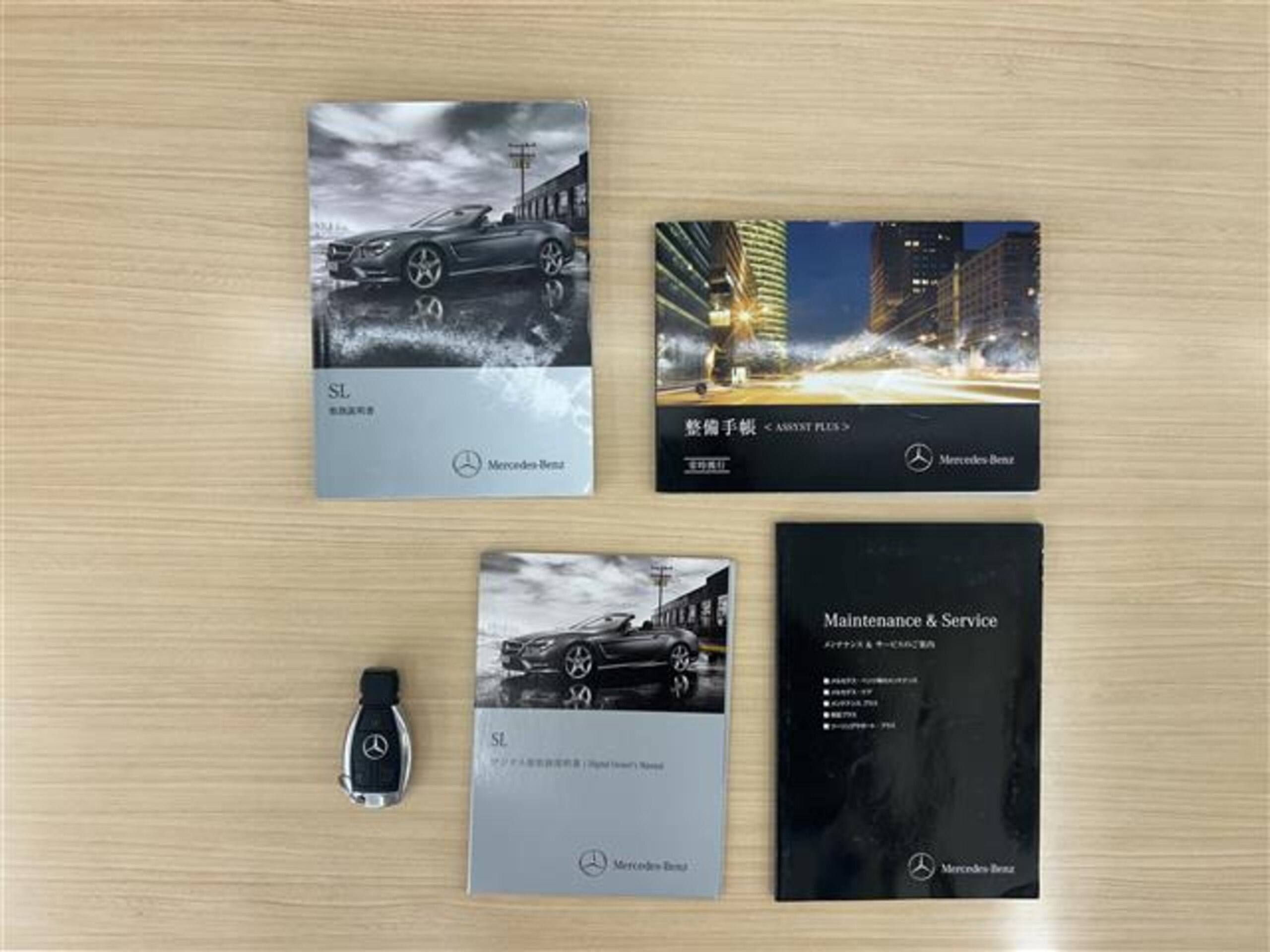 2013 Mercedes-Benz SLClass - メルセデス・ベンツ SLクラス SL550 ブルーエフィシェンシー 禁煙車/ナビ/バックカメラ/ETC/ルーフオープン/マジックスカイコントロール/ハーマンカードン/赤革レザーシート/シートヒーター/エアスカーフ/安全装備/パワーバックドア/保証書/取扱説明書